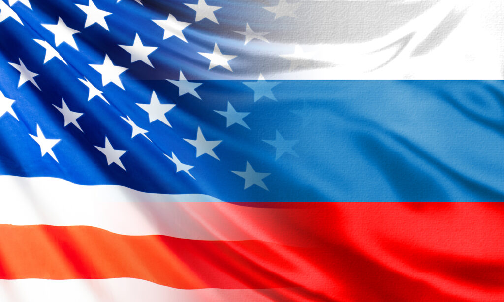 Relations between Russia and the United States. USA flag smoothly passes into the flag of Russia. Concept - diplomatic relations between Moscow and Washington. Concept - negotiations with America